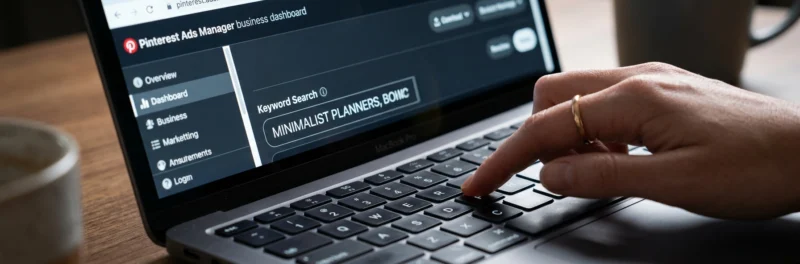 A close-up of a laptop screen during keyword setup for a Pinterest ad campaign.